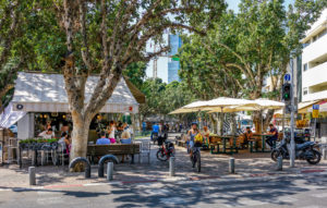 Cafes and bike paths on tree-lined Rothschild Boulevard